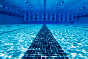 An image of a pool lane underneath the water